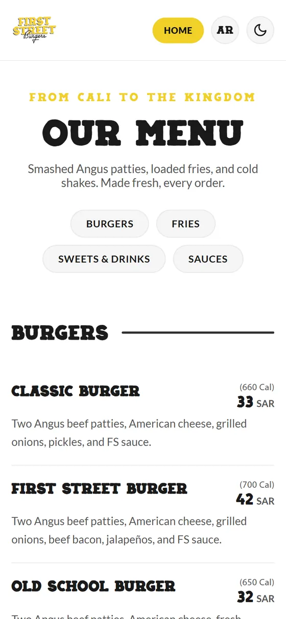 First Street Burgers Website — The English menu page on a phone, with burger prices and calories